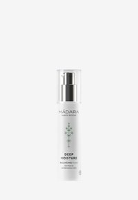 Flacon pompe blanc avec des accents argentés, étiqueté "MÁDARA Fluide Équilibrant Hydratation Profonde", avec un graphique de plante verte pour peaux normales à mixtes.
