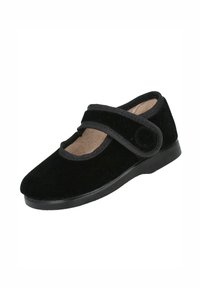 Zapato Mary Jane de terciopelo negro con tira elástica y forro interior suave, con punta redonda y suela de goma baja.