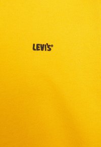 Levi's® Gold Tab CREW - Sportska majica - golden orange
