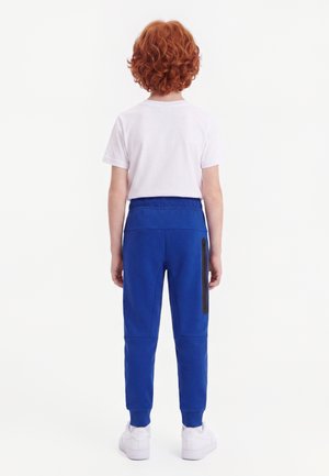 Nike Performance PARIS GERMAIN PSG PANT UNISEX - Pantalon de survêtement - old royal/ white