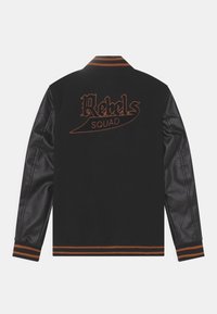 Black varsity jacket with leather sleeves, orange ribbed cuffs and collar, and "Rebels SQUAD" embroidered on the back.