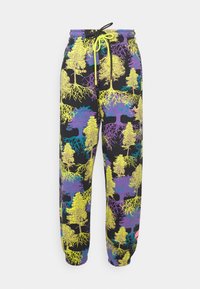 Black joggers with bright yellow, purple, and blue tree and root patterns, elastic cuffs, and black and yellow drawstrings at the waist.