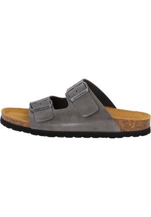 Gray suede sandal with two adjustable straps and metal hardware. Cork footbed and black rubber outsole. Open design with smooth texture.
