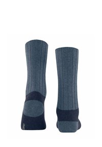 Chaussettes côtelées bleu foncé avec des talons et des orteils renforcés. Fabriquées en matériau souple et extensible pour le confort et la durabilité.