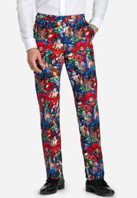 Colorful trousers featuring a dense comic book character pattern with red, blue, and green hues. Made of fabric with a smooth texture.