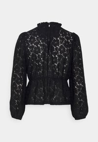 Svart spetsblus med hög hals, puffärmar och bandad midja. Invecklat blommönster med en subtil transparent effekt. Bakre dragkedjestängning.