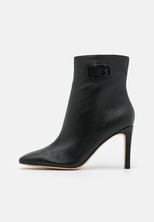 Stivaletti con tacco - black