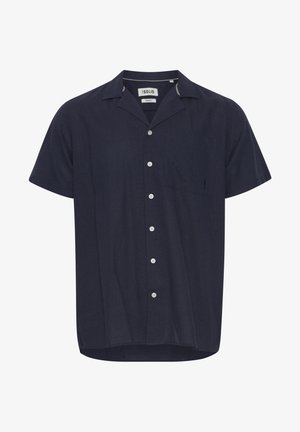 Chemise à manches courtes bleu marine en tissu texturé, avec un col, une patte de boutonnage sur le devant et une poche poitrine gauche au design simple.