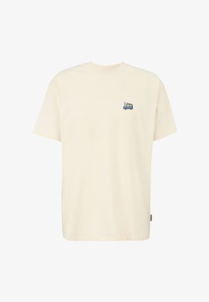 T-shirt a maniche corte color crema con una piccola grafica di un camper blu e tavole da surf sul petto sinistro.