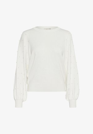 Valge sviiter ümarate kaeluste ja puhvadega varrukatega. Varrukatel on väiksed tekstuuriga täpid. Valmistatud pehmest kudumist.