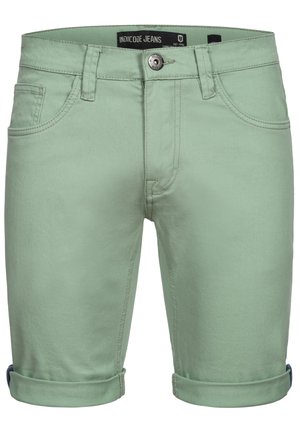 Pastellgrüne Jeansshorts mit umgeschlagenen Säumen, Fünf-Taschen-Design, vorderem Knopfverschluss und kontrastierenden Nähdetails.
