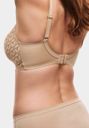 Beige-BH mit strukturiertem Spitzenbesatz auf der Cup-Oberfläche, verstellbaren Trägern und Haken- und Ösenverschluss am Rücken. Glattes Material, nahtloses Design.