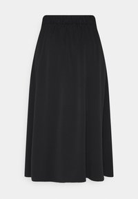 Jupe midi noire avec taille élastique, tissu fluide et fente latérale discrète, présentée sur un fond uni.