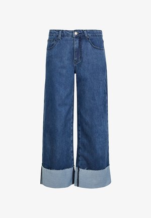 Pantalons en denim à jambes larges de couleur bleu foncé, dotés d'un ourlet effiloché et d'accents de poignet bleu clair. Fermeture à bouton et design de poches traditionnel.