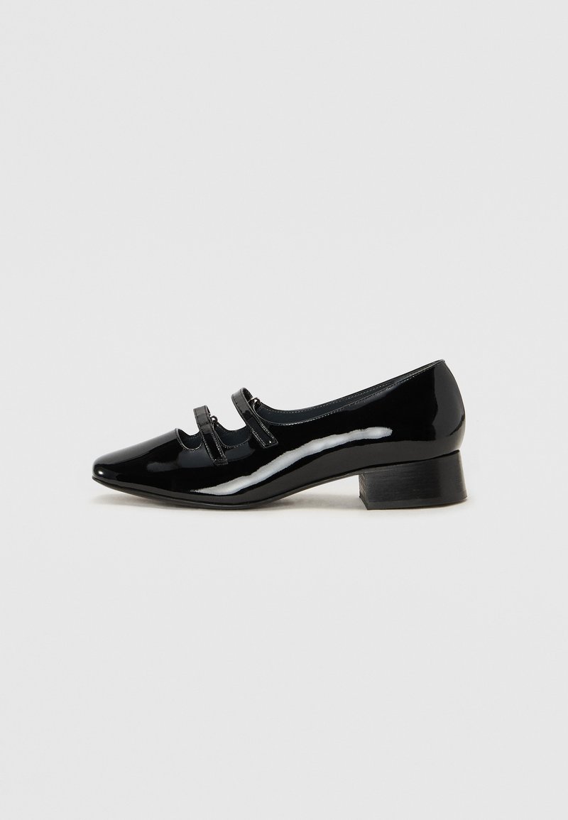 Black patent leather shoe with a pointed toe, low block heel, and three decorative straps across the front. Smooth, shiny texture.