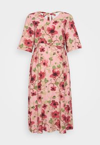 Floral dress with a pink background, featuring red and green flower patterns, short flutter sleeves, and a V-neck with a tie detail at the back.