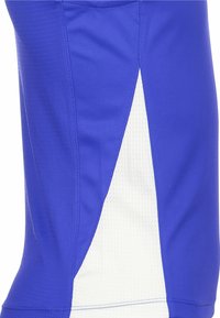 Pantaloni sportivi blu con una pannello bianco laterale. Realizzati in materiale leggero e liscio con un motivo testurizzato.
