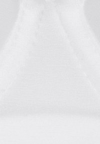 White fabric with a smooth, textured surface. Features a triangle shape with a seamless design and slightly raised stitching.