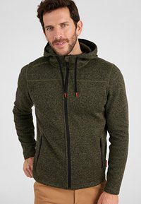Olivgrüne Kapuzenjacke aus strukturiertem Stoff mit schwarzem Reißverschluss und Kordelzügen; verfügt über seitliche Taschen und ein Logodetail.