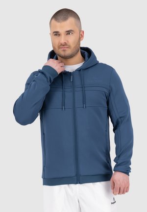 Hooded zip-up jacket in dark blue with textured chest panel, kangaroo pockets, and ribbed cuffs for a fitted finish. Cotton blend fabric.