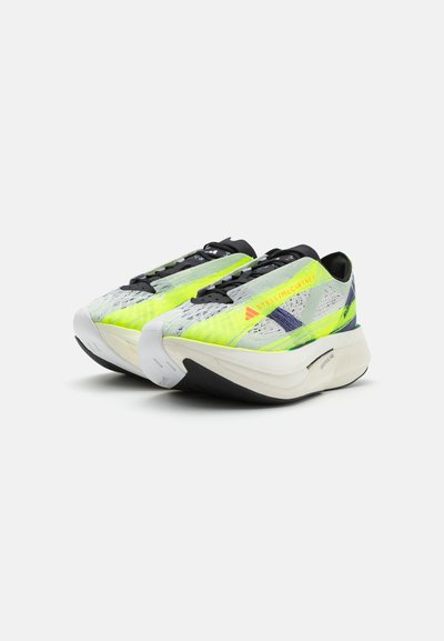 adidas by Stella McCartney PRIME STRUNG - Katujuoksukengät - linen green/collegiate purple/off white