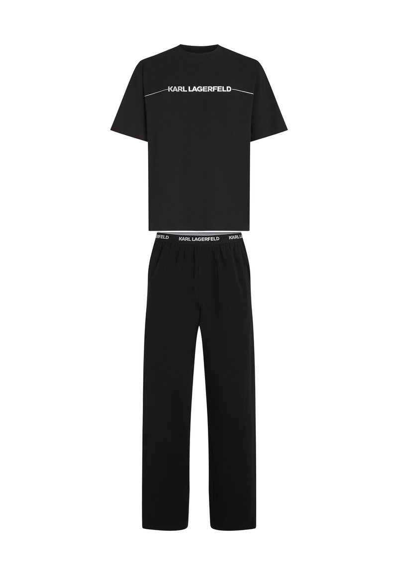 Must musta Karl Lagerfeld kaheosaline mugavusriiete komplekt, mis sisaldab ümarakaelusega lühikeste varrukatega särki ja vabalt langevaid pükse, millel on elastne vöökoht.