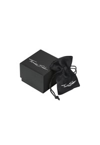 Scatola per gioielli nera con finitura opaca e sacca con coulisse in materiale simile alla seta, con il logo Thomas Sabo in bianco.