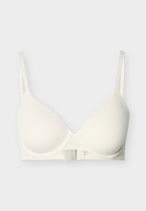 Soutien-gorge blanc rembourré avec bretelles ajustables et fermeture à crochet à l'avant sur un fond clair.