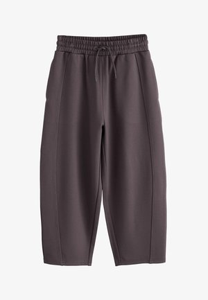 Mørkegrå joggingbukser med elastik i taljen og snøre, med lige ben og lodrette sømdetaljer foran.