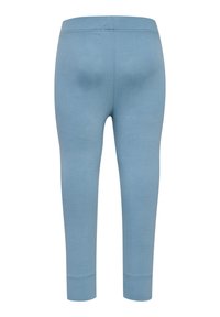 Helle blaue Leggings aus einem elastischen Stoff, mit einer glatten Textur, schmalen Knöchelabschlüssen und einem nahtlosen Taillenbund für zusätzlichen Komfort.