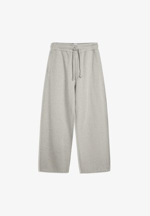 Lichtgrijze joggingsbroek van een zachte katoenen mix, met een elastische tailleband met trekkoord, twee zijzakken en een ontspannen, brede pasvorm.