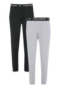 Zwei Paar Jogginghosen in Schwarz und Hellgrau aus Baumwollmaterial mit elastischen Taillenbündchen, die das Logo "THREADBARE" tragen.