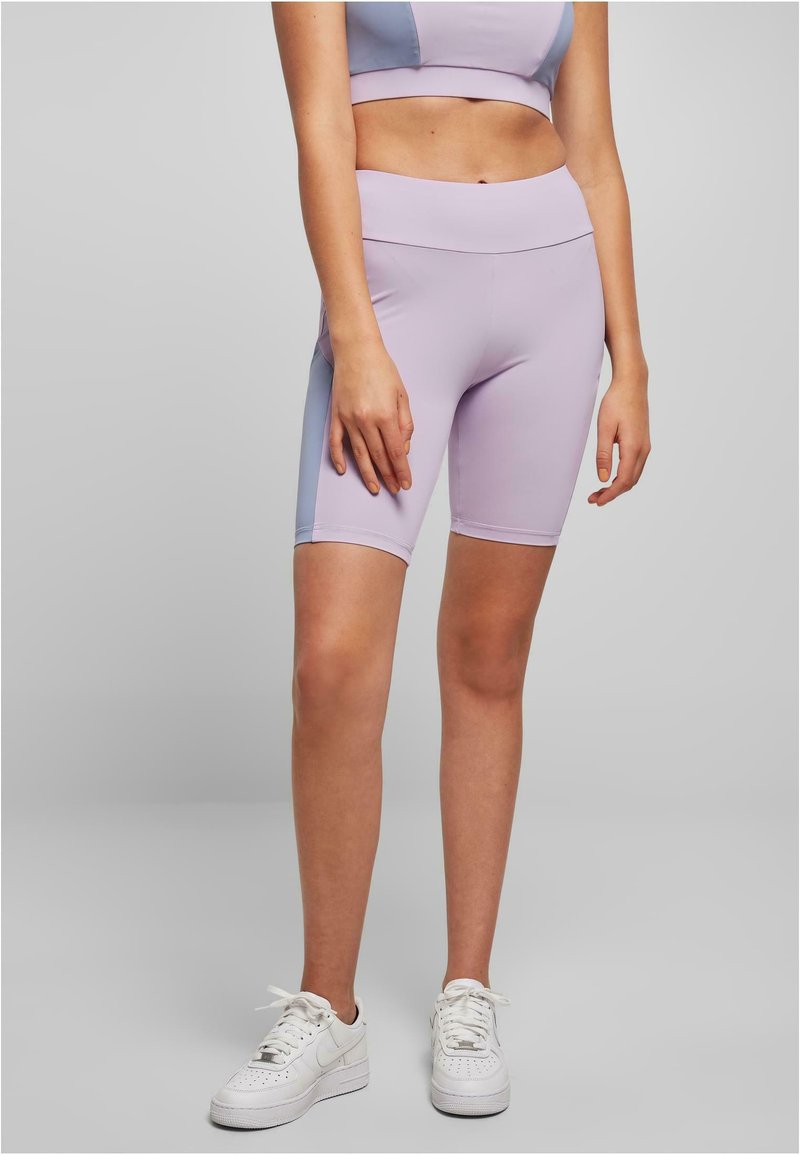 Lavendel Sportshorts aus einem dehnbaren Stoff mit hohem Bund. Mit Farbblockierung in Hellblau an den Seiten.