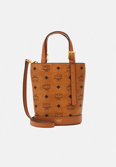 Brown leather bucket bag with embossed logos and black diamond patterns, featuring two short handles and a detachable shoulder strap.
