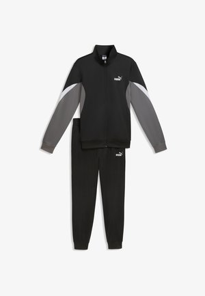 Czarny dres Puma z bluzą zapinaną na zamek błyskawiczny ozdobioną szarymi i białymi akcentami na rękawach oraz dopasowanymi dresowymi spodniami z elastycznymi ściągaczami i logo.