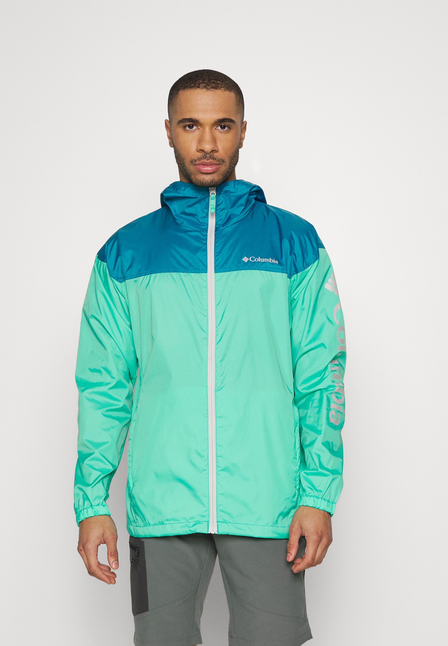 turquoise windbreaker