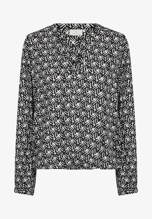 Čierno-biela blúzka s dlhým rukávom, ktorá je zdobená textúrovaným vzorom listov, má výstrih do V a voľný strih. Vyrobená z ľahkej látky.