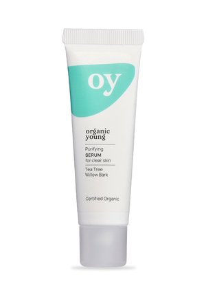 Tube mit reinigendem Serum für klare Haut aus biologischem Anbau, mit Teebaum und Weidenrinde, gekennzeichnet als zertifiziert biologisch.