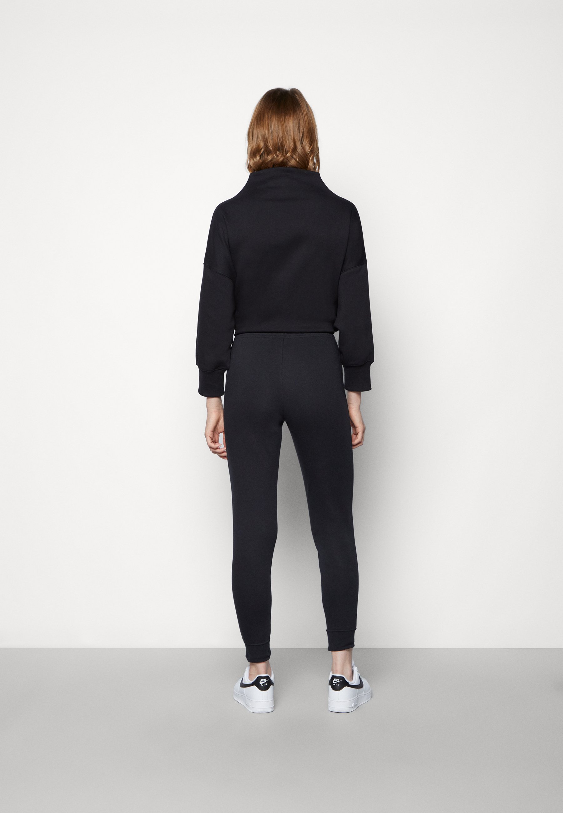 tight nike tracksuit bottoms