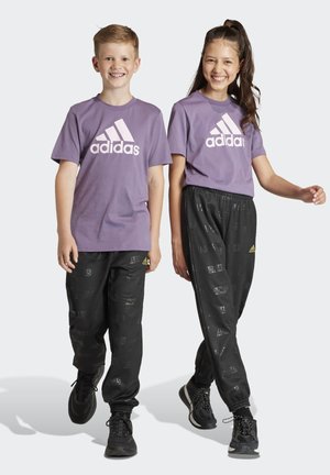 adidas Sportswear BRAND LOVE - Trainingsbroek - black/gold metallic