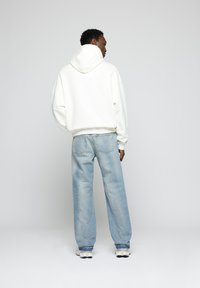 EIGHTYFIVE OPEN HEM - Jean large - light wash blue