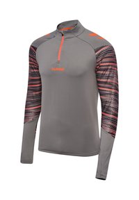 Grijs sportshirt met lange mouwen, oranje rits, zwart-oranje gemêleerde mouwen en "hummel"-logo op de borst.