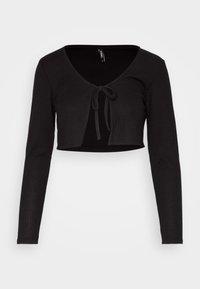 Svart ribbad croptop med långa ärmar, V-ringning och en knytning framtill. Mjuk textur och figurnära design.