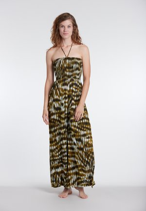 Strapless patroon jumpsuit in groen- en bruintinten, met een smocked lijfje en wijde benen, gemaakt van lichtgewicht stof.