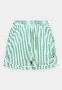 Zaļas un baltas vertikāli svītrainas šorti ar elastīgu vidukļa joslu un nelielu melnu "CK" logotipu apakšējā labajā kājā.