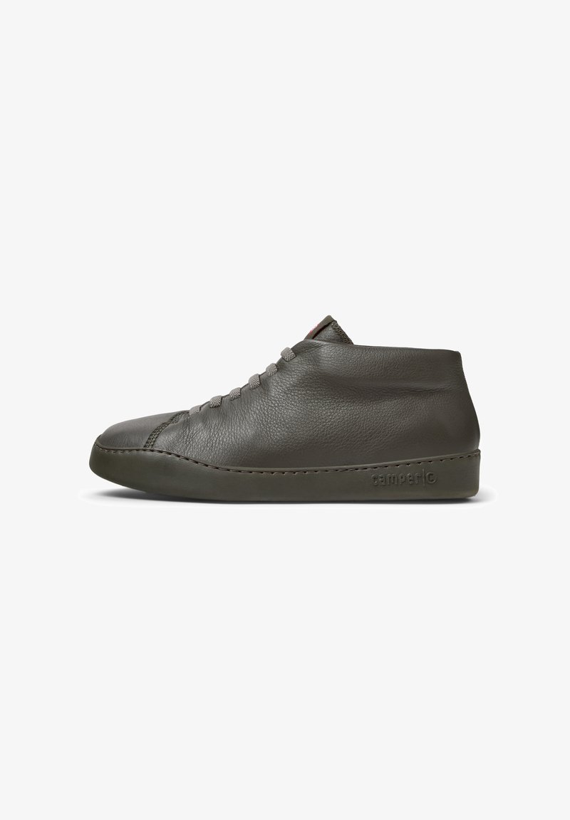 Gray leather high-top sneaker with rounded toe, textured finish, subtle stitching, and rubber sole, featuring logo on the side.