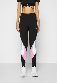 Svarta leggings med färgglada sidopaneler i rosa, ljusblått och vitt. Mjuk material, hög midja och logotypdetalj på höfterna.