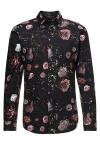 Mustapainikepaita, jossa on kukkakuosi vaihtelevilla vaaleanpunaisen ja valkoisen ruusun sävyillä. Valmistettu kevyestä kankaasta, jolla on sileä rakenne.