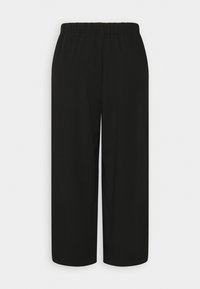 Schwarze weit geschnittene Hose mit elastischem Bund, glatter Textur und ohne sichtbare Muster oder Beschläge, die für Komfort und Bewegungsfreiheit ausgelegt ist.