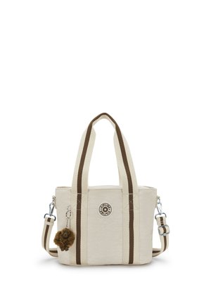 Borsa tote in tela beige con strisce marroni, doppi manici, tracolla staccabile e portachiavi a forma di scimmietta di peluche marrone attaccato.